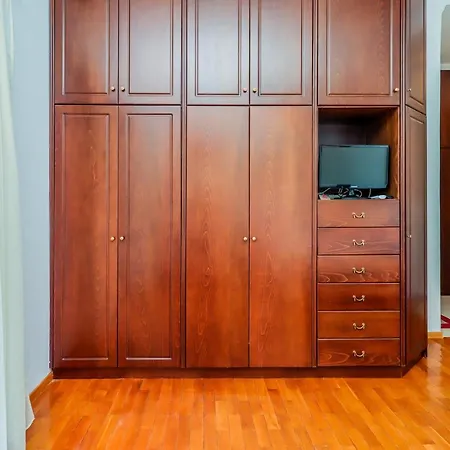 Acropolis With Parking Next To Center Széresz